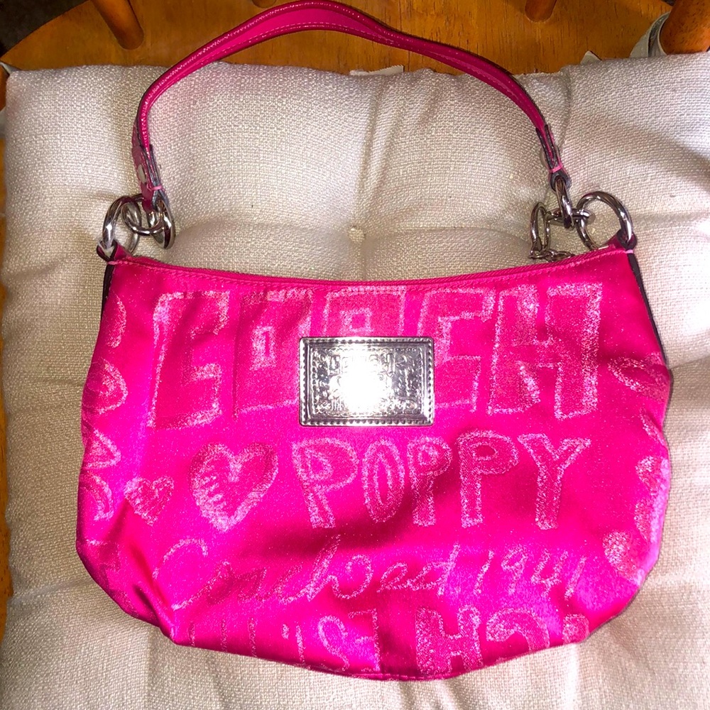 This is a vintage COACH POPPY 1941 handbag